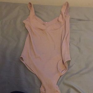 2 body suits, cropped black tank top and maroon